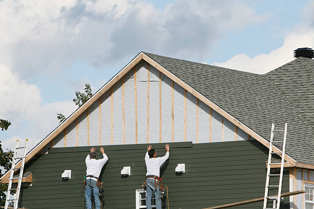 Professional Siding Replacement technician working in Elm City, NC
